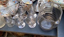 Clear glass silver banded Pitcher and Glasses