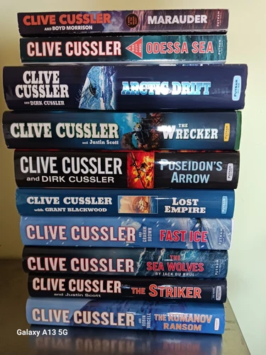 Lot of 10 Clive Cussler 8 Hardcover 2 Paperback Books - Picture 1 of 2