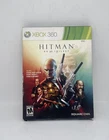 Hitman HD Trilogy (Xbox 360) Rare GOOD Condition w/Slip Cover & Art Book!