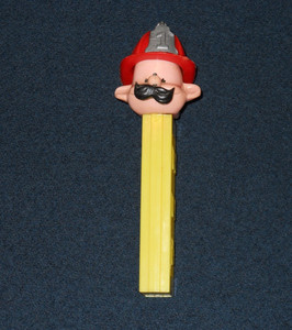 PEZ Fireman on Yellow 2.6 Made in Austria Stem with Red #1 Hat and Mustache