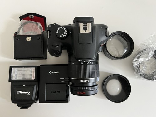 Canon EOS Rebel T100 18.0MP DLSR Camera w/18-55mm Lens and Accessories