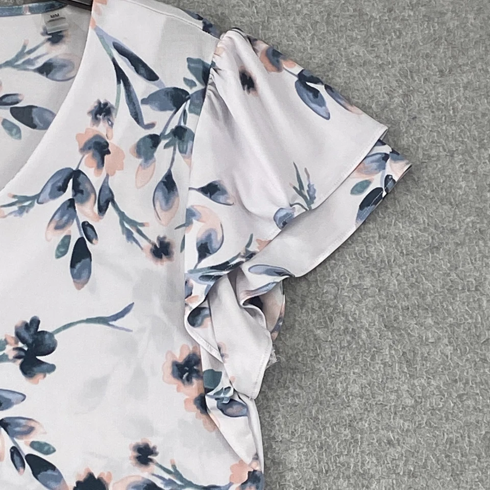 Blusa Tahari Top Mujer M Blanca Azul Floral Flutter Manga Corta Cuello en V Tejida Foto 3 de 4