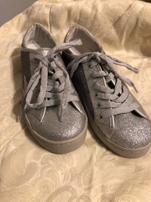 shiny silver tennis shoes