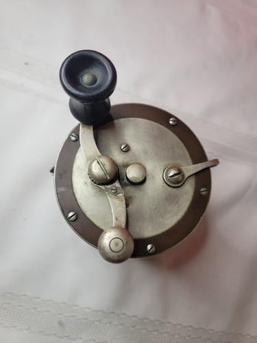 Antike PFLUEGER OCEANIC Brandungsguss Freispulenrolle Patente nur ausstehende Teile - Bild 8 von 9