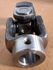 U-JOINT FORGED 1" ID ONE END 1-1/4" ID OTHER END  KEYWAY AND TAPPED FOR SET SCR