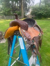 Corriente Barrel Saddle with custom ponchos and engraved barrel stirrups