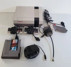 Y-229 VINTAGE NES CONSOLE BUNDLE-CONTROLLERS, POWER CORD, LAZER GUN, GAME, +!