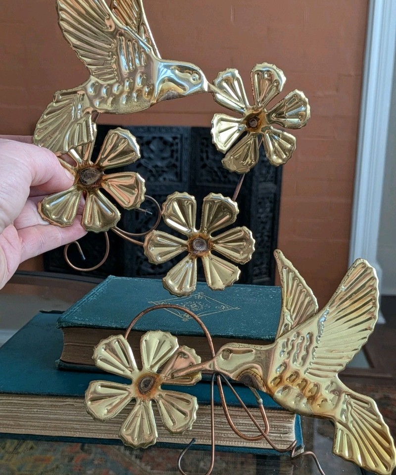 A pair of genuine vintage Homco 3D hummingbird wall hangings in gold-tone metal — the kind of charming mid-century wall art that sells out at estate sales.