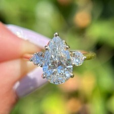 3.10 CTW 14K White Gold Plated Pear Cut D/VVS1 Moissanite Women's Wedding Ring