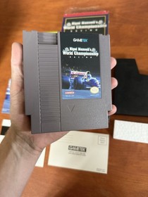 Nigel Mansell&rsquo;s World Championship Racing (Nintendo NES) MINT w/ Poster & Reg