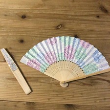 Multicolored floral folding fan with wooden handle, 21cm diameter unused