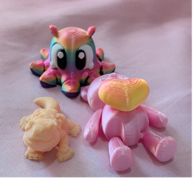 Mini 3d printed Figure Set: Bear spinning heart, bearded dragon and octopus.