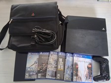 Sony PlayStation 4 500 GB  Bundle With Controller, 7 Games, And Carry Bag