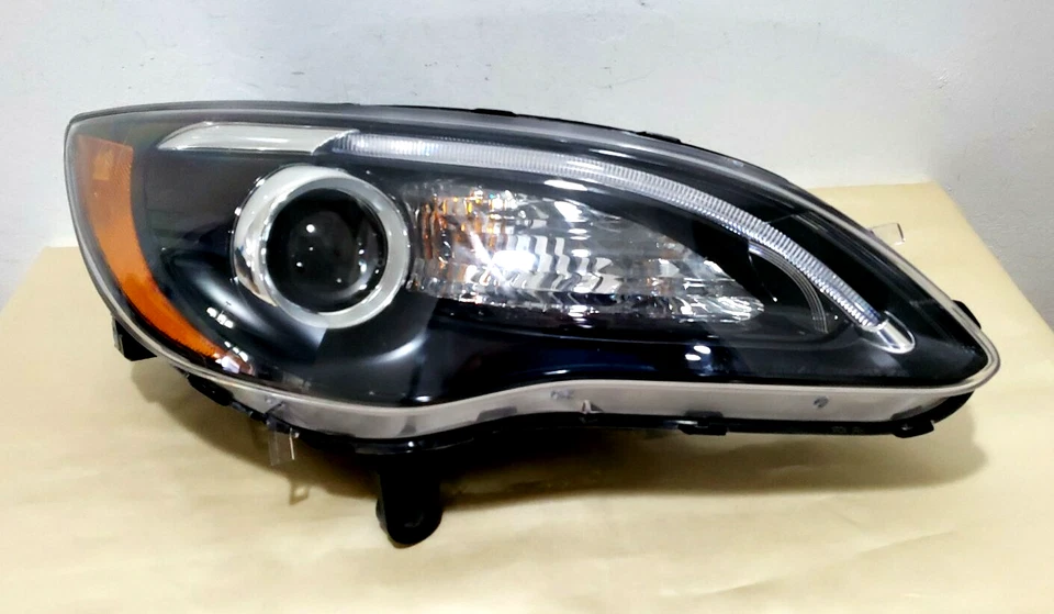 Faro LED halógeno para pasajero derecho Chrysler 200 2012 2013 2014 fabricante original usado #1 Foto 2 de 4