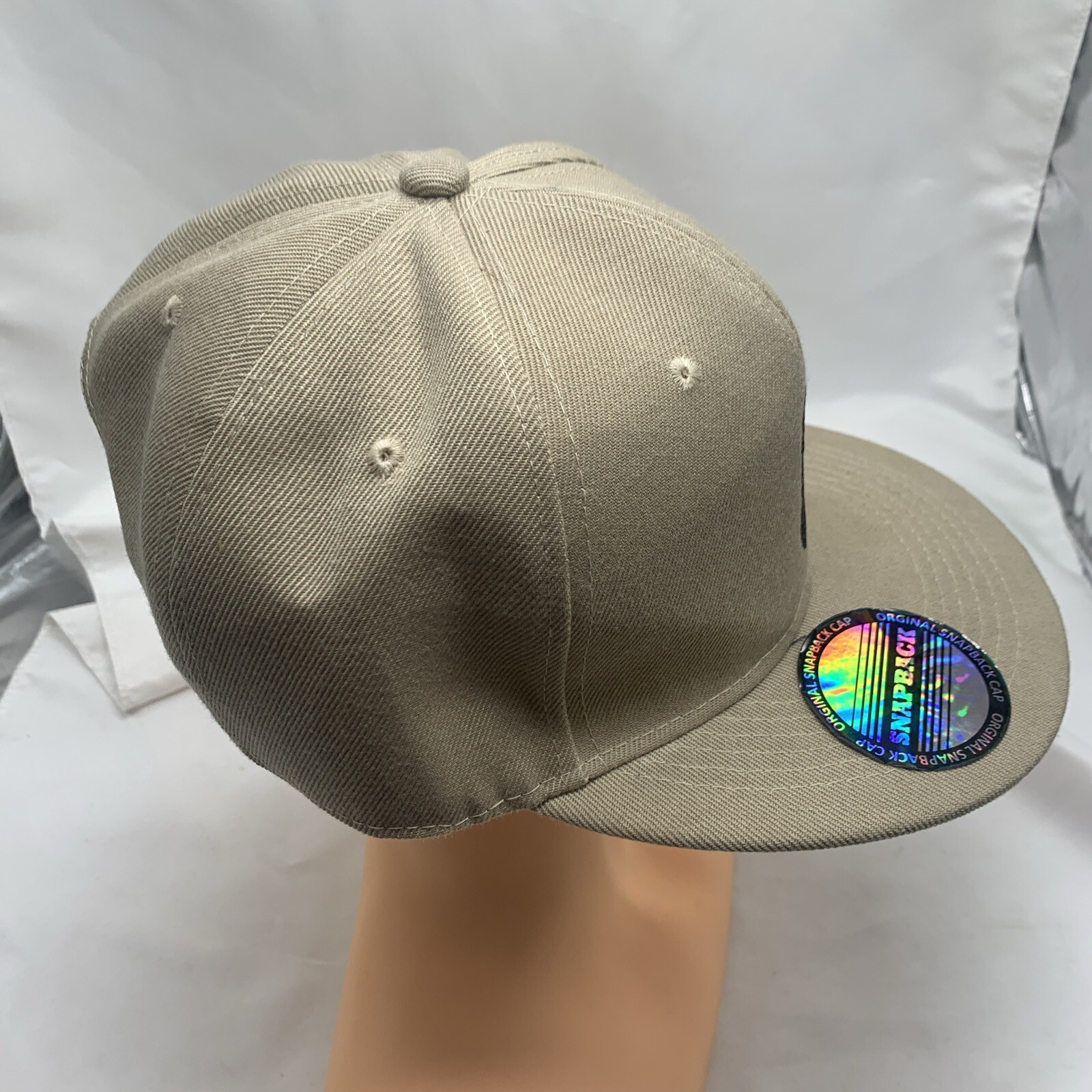 Cappello Polo Ralph Lauren marrone chiaro con logo blu pony ricamato regolabile