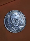 The Silver Star Oliver North 1 oz .999 Fine Silver Round Vintage Round You Grade