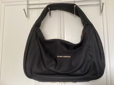chiara ferrangi CAIA Borsa nera in tessuto a mezzaluna con piedini metallici
