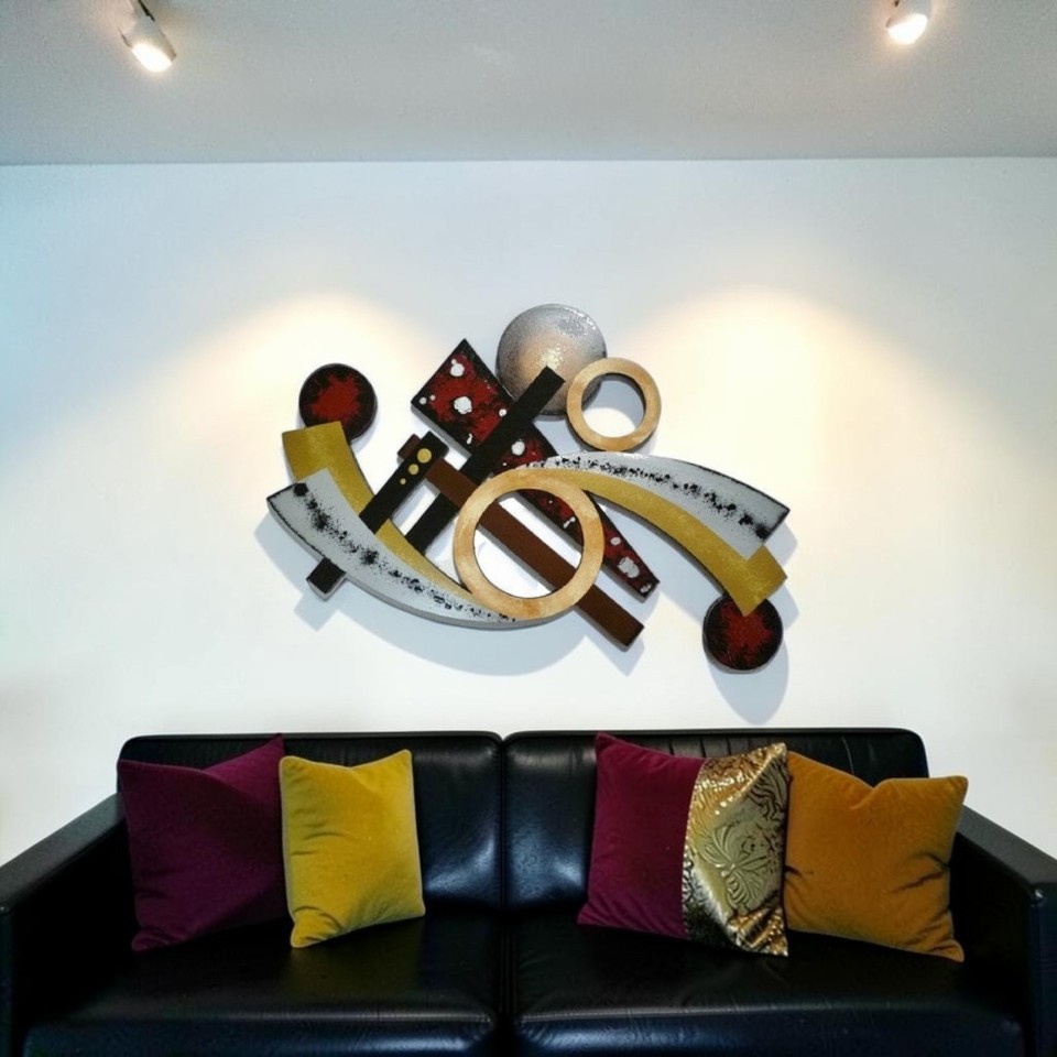 A handcrafted 35x25" mid-century burgundy wood wall sculpture that looks like it escaped a 1965 architect's living room.