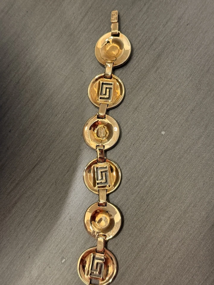 Pulsera de eslabones Versace Medusa y llave griega tono dorado con detalles de cristal Foto 2 de 2