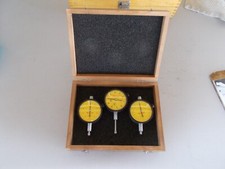 Good Used Starrett 3-piece Dial Gauge Set with padded carry case.