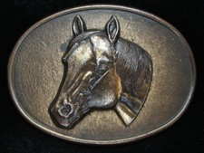 PC09150 NOS VINTAGE 1970s  HORSE  OVAL-SHAPED BRASSTONE BELT BUCKLE
