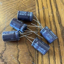 ILLINOIS CAPACITOR CKEM 107CKE200M  100uF 200V B105 Degrees Celsius New Qty-5