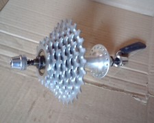 NOS SUNTOUR 7 SPEED HUB & SKEWER & MICRODRIVE CASSETTE,1990's