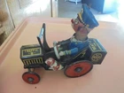 Vintage Marx Beat It the Komikal Kop tin wind-up