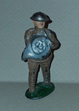Vintage Manoil Barclay toy soldier. Soldier Playing French Horn. Tin helmet