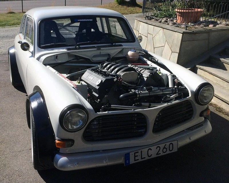 It's a 1967 Volvo Amazon with a Roaring BMW V-8