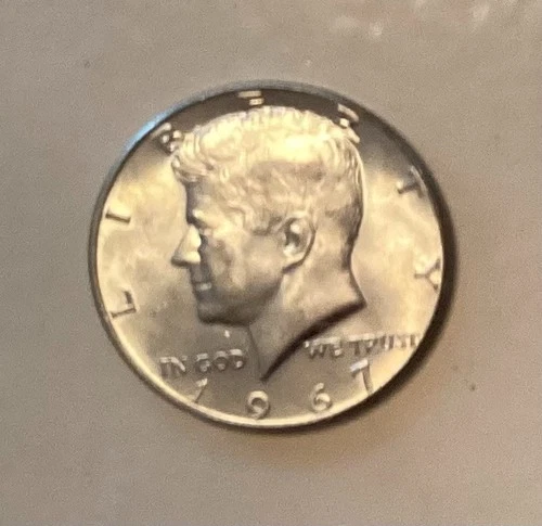 1967 Kennedy half dollar in good circulated condition 40% silver