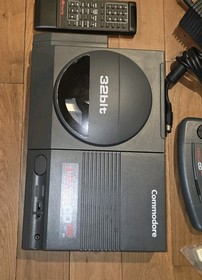 Commodore Amiga CD32 Gaming Console + TVI Modem Remote, Controller  WORKS!