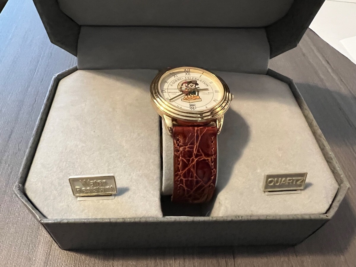 DISNEY MICKEY AND MINNIE MOUSE A GOEBEL CELEBRATION CALENDAR WATCH 1998  CROTON