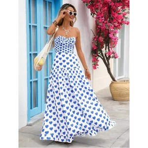 emily in paris blue polka dot dress 9 Fashion Lessons We Can Learn from Emily in Paris