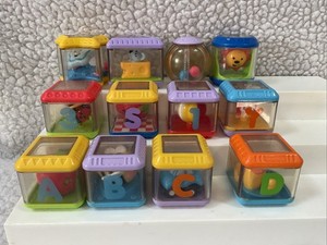 FISHER PRICE PEEK A BLOCKS       LOT 1.