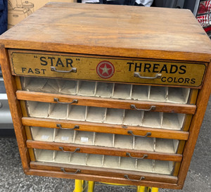 Star Threads Fast Colors cabinet Oak4 glass and one wood drawer with inserts.