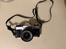 Canon AE-1 Program SLR Film Camera with Lens and Strap, Black and Silver
