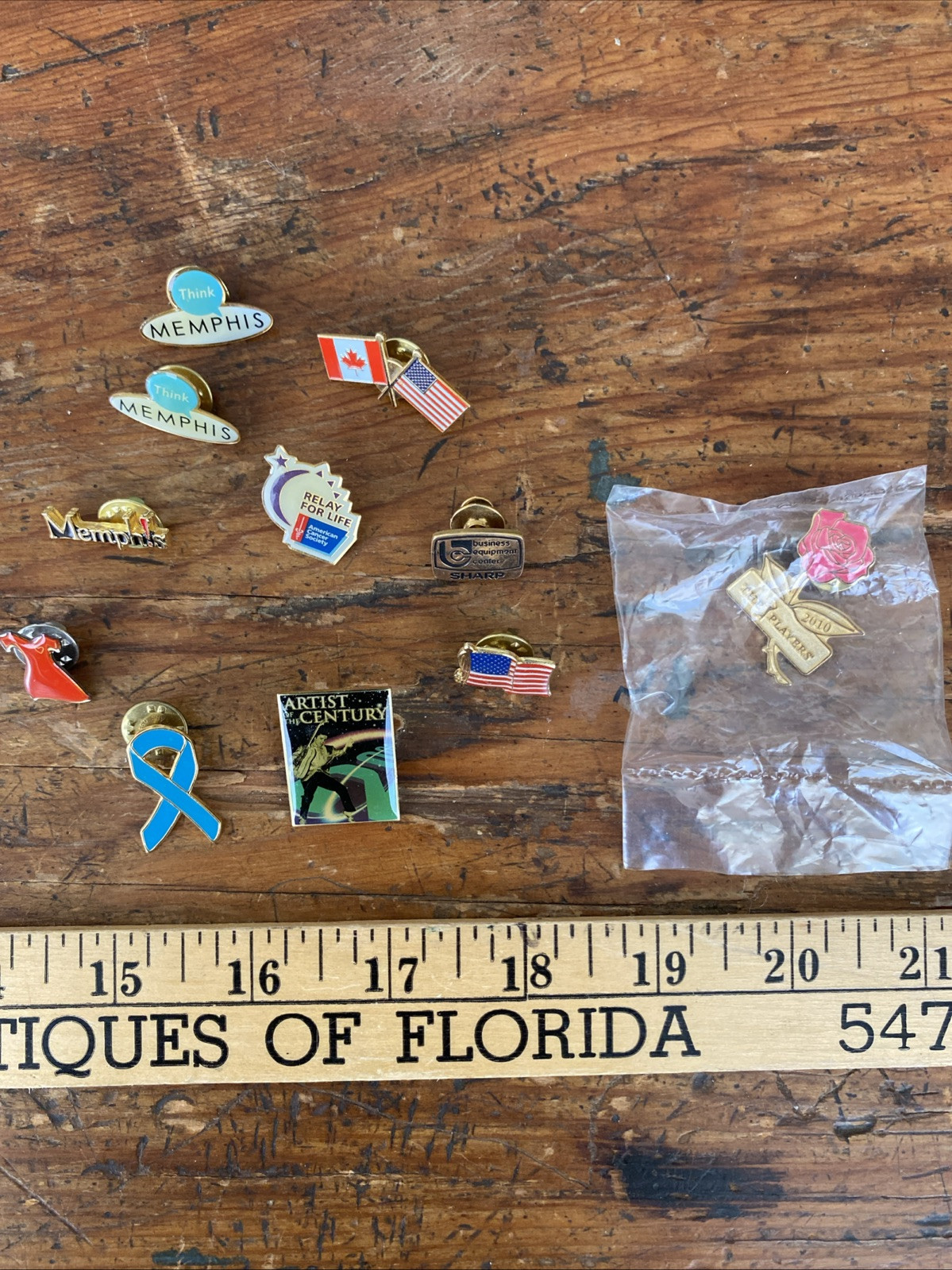 10 Assorted Lapel Pins Including A 2010 TPC Golf Tournament