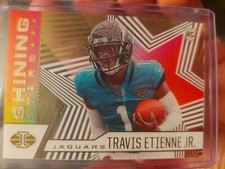 2021 Panini Illusions Football Travis Etienne Rookie Card Shining Stars Insert