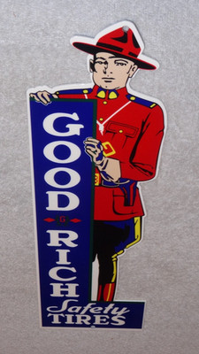 VINTAGE GOODRICH SAFETY TIRES W/ MOUNTIE 15'' METAL B.F. MOUNTY GASOLINE OIL SIGN