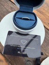 Platinum Wedding band, moissanite ring