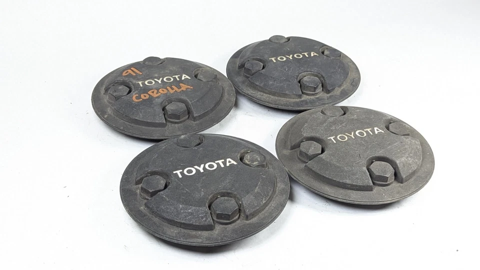 Juego de 4 tapas centrales negras Toyota Corolla Tercel 1986-1992 716814 OEM originales Foto 3 de 4