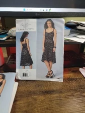 VOGUE PATTERN 1447  DRESS  DESIGNER  MISSES SIZES  4 6 8 10 12  UNCUT