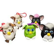 Furby McDonald's toy lot. 3 push button toys and 2 plush keychains.