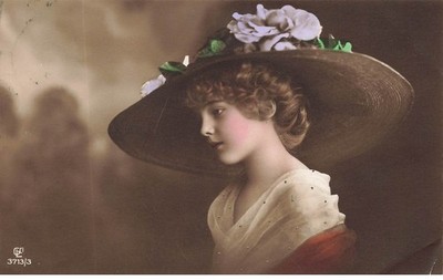 Children - Grete Reinwald wearing a hat with a wide edge, decorated with fl