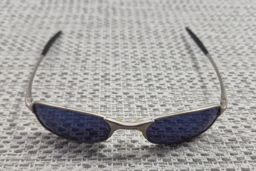 VTG 90s Oakley Sunglasses Mens Silver Metal Wrap Blue Tinted Lenses Sport Casual
