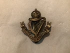 GENUINE WW1 BRITISH MILITARY CAP BADGE TYNESIDE IRISH REGIMENT VGC SLIDER