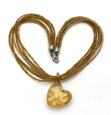 Beaded Necklace with Heart Shaped Clear Resin Pendant with a Floral Design