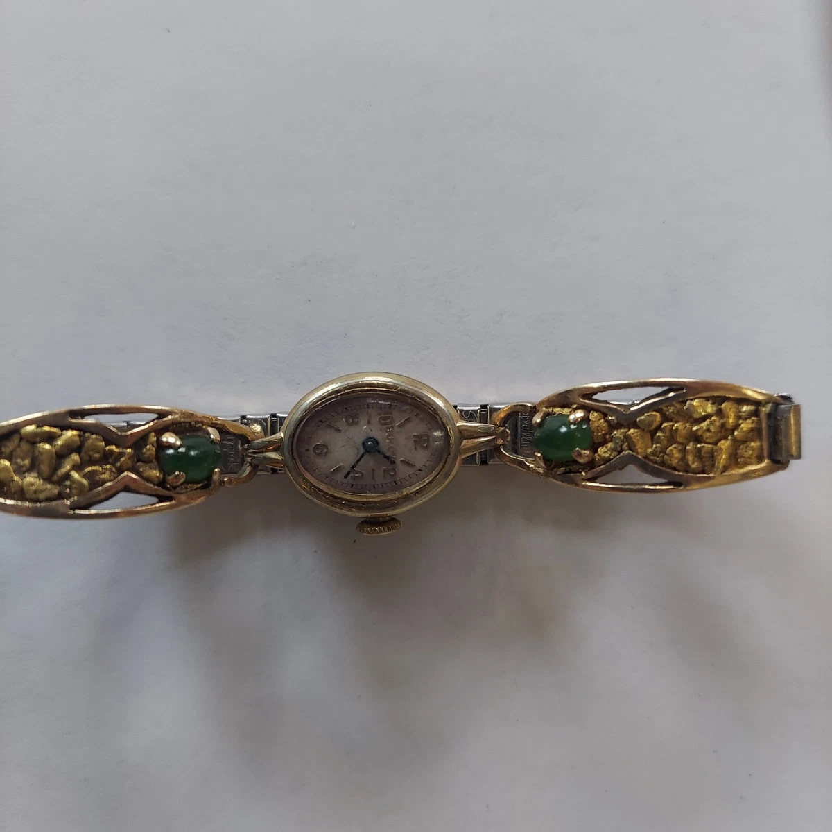 Bulova gold cheap nugget watch