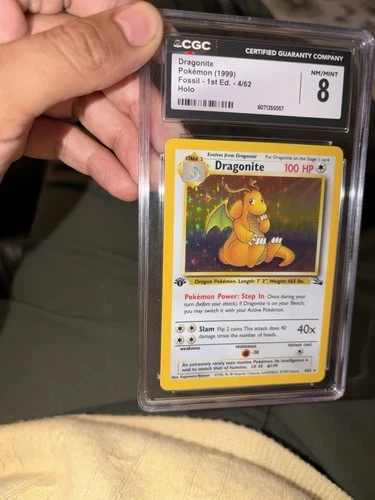 Dragonite Fossil 1st Edition Holo Rare CGC 8 Pokémon Card 4/62 (1999)
